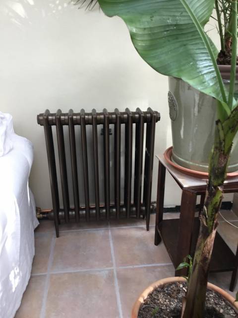 cast iron radiator in summer room