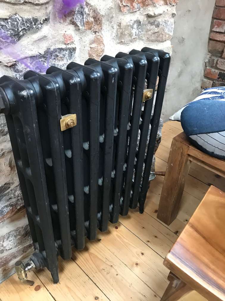 cast iron radiator in Tenby