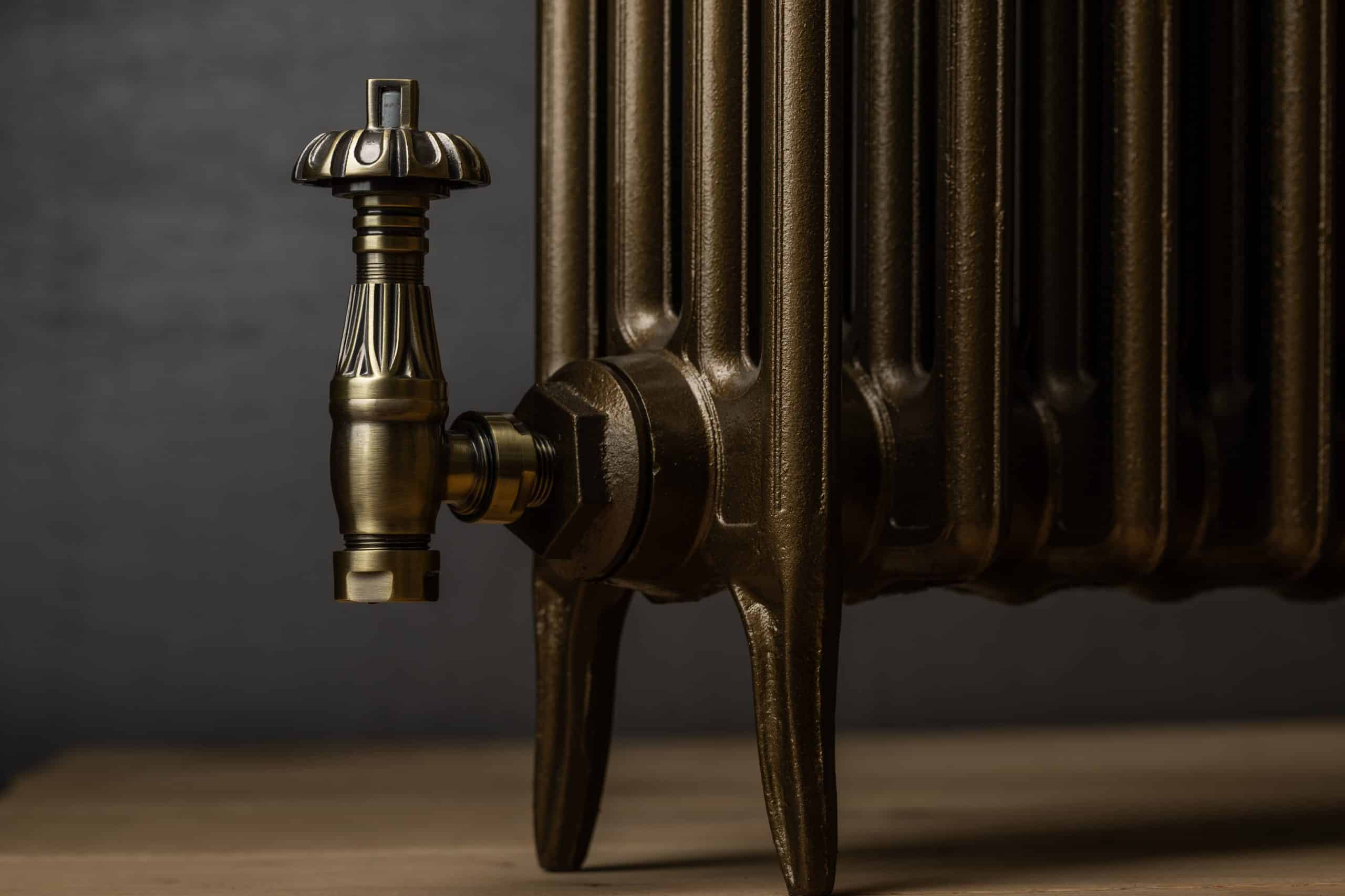 Vintage cast iron radiator with valve
